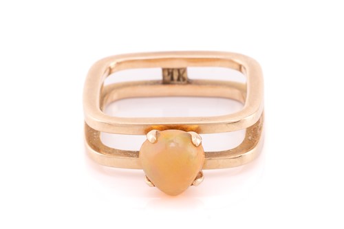 Lot 7 - An Ethiopian fire opal ring, consisting of a...