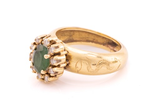 Lot 24 - A yellow metal, diamond, and emerald cluster...