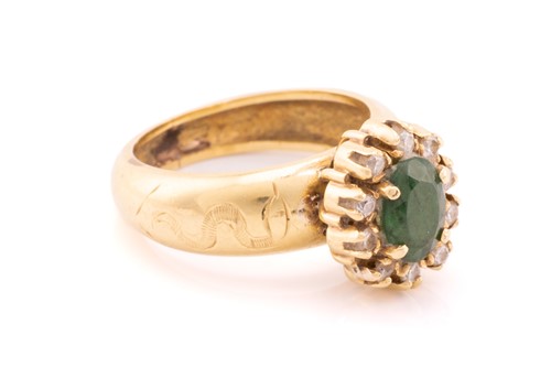 Lot 24 - A yellow metal, diamond, and emerald cluster...