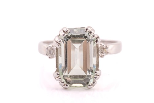 Lot 99 - A pale green beryl cocktail ring, set with a...