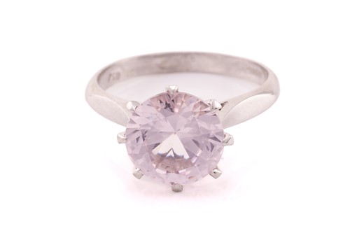 Lot 253 - A pink spinel solitaire ring in 18ct white...