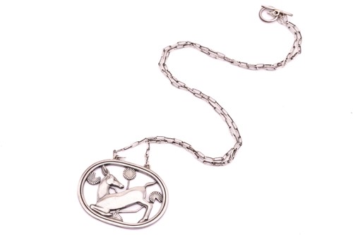 Lot 374 - Georg Jensen - A necklace with kneeling fawn...