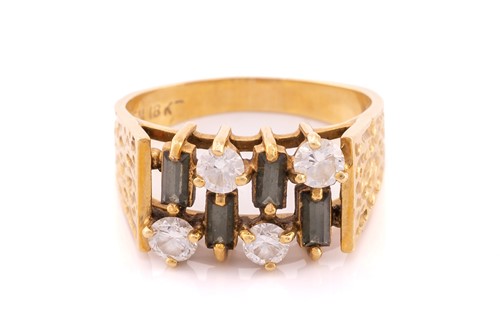 Lot 214 - A diamond and tourmaline dress ring set with...