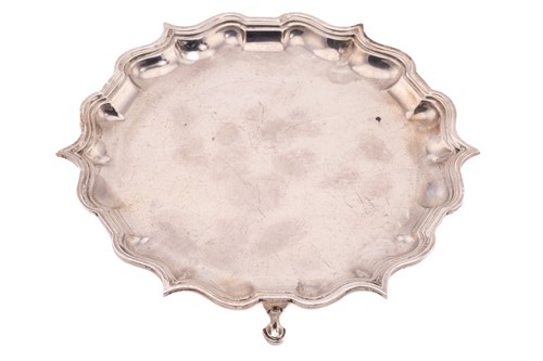 Lot 458 - A George III-style circular silver waiter,...