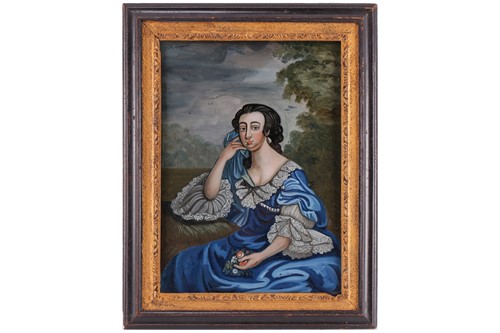 Lot 52 - A reverse painted on glass portrait of a...
