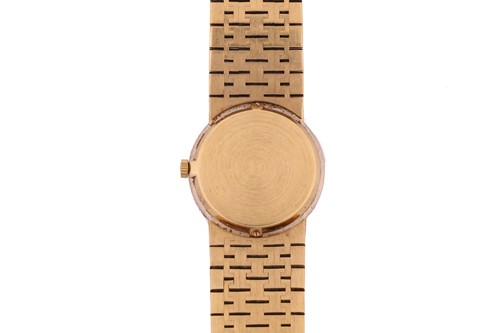 Lot 388 - A Piaget lady's diamond set wristwatch,...