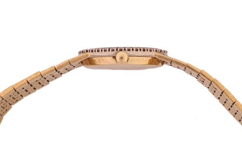 Lot 388 - A Piaget lady's diamond set wristwatch,...