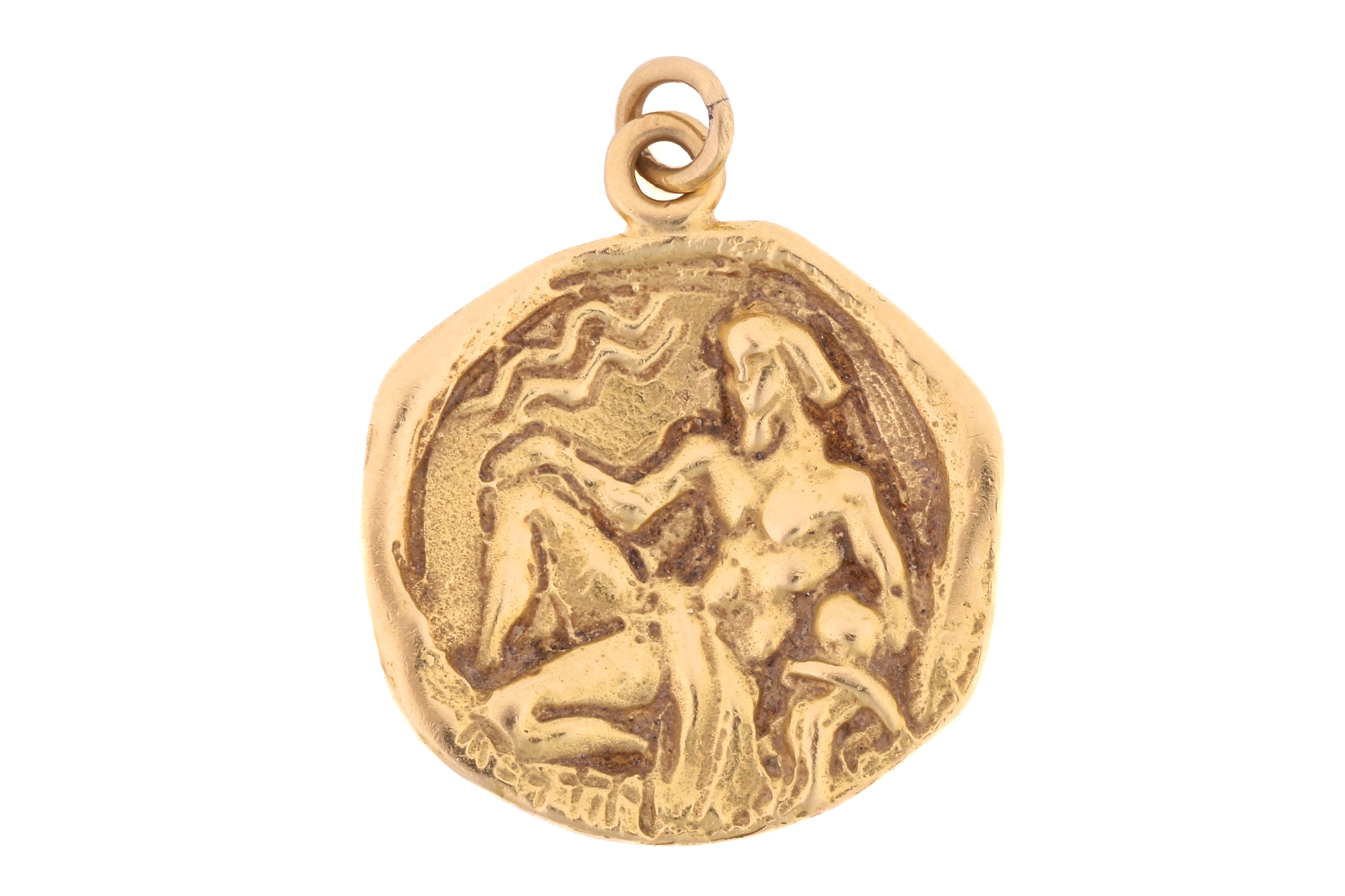 Lot 2 Cartier. An 18ct yellow gold Zodiac pendant