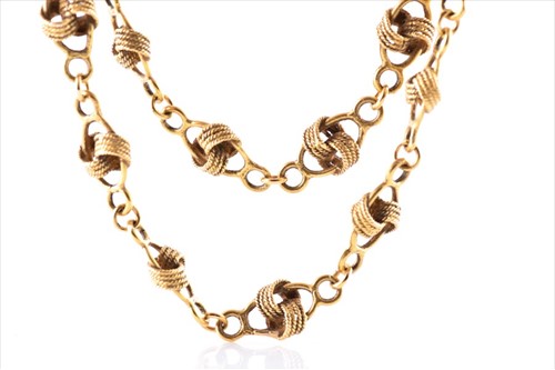Lot 503 - A yellow gold knotted fancy-link chain...