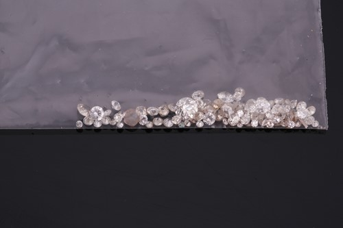 Lot 252 - A 4.95ct melee parcel of loose diamonds...