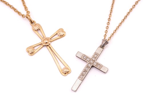 Lot 257 - A 9ct white gold and diamond set cross pendant...