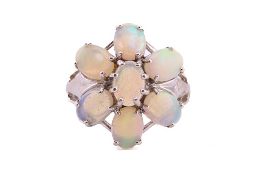 Lot 166 - A 9ct white gold and opal floral cluster ring,...