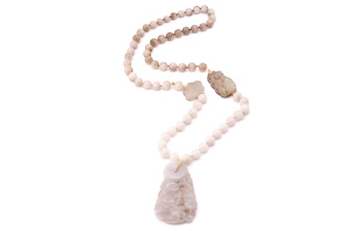 Lot 132 - A jade pendant with quartzite bead necklace,...