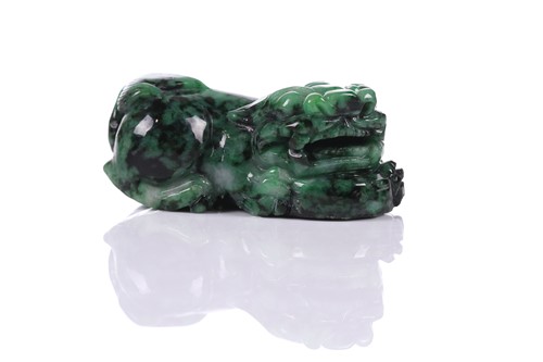 Lot 90 - A Chinese hardstone carving of a young boy...