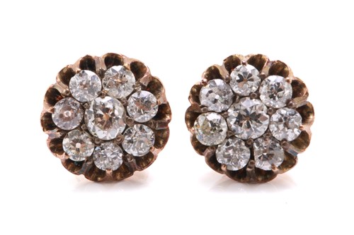 Lot 33 - A pair of diamond cluster earrings, each...