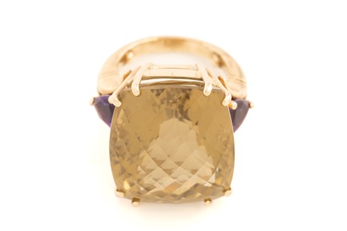 Lot 151 - A large citrine and amethyst cocktail ring,...