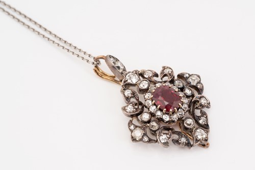 Lot 55 - A ruby and diamond pendant on chain, of...