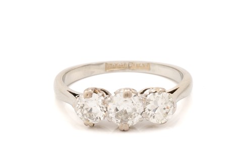 Lot 139 - A diamond trilogy ring, claw-set with...