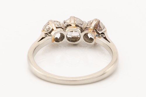 Lot 139 - A diamond trilogy ring, claw-set with...
