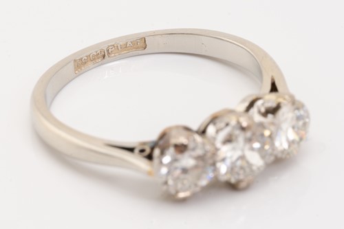 Lot 139 - A diamond trilogy ring, claw-set with...