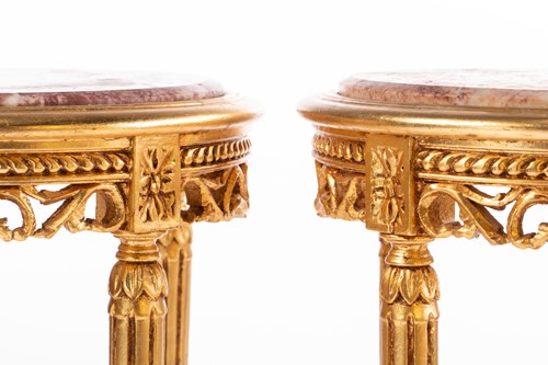 Lot 112 - A pair of Louis XVI style carved and gilt...