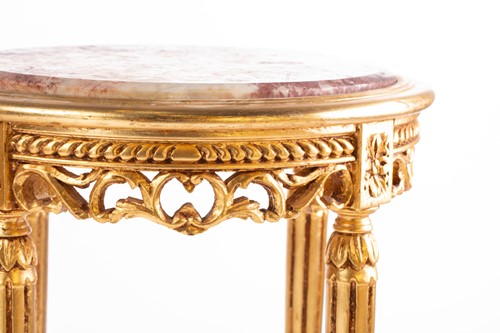 Lot 112 - A pair of Louis XVI style carved and gilt...