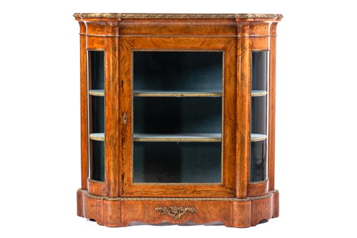 Lot 119 - A Victorian figured walnut credenza with a...