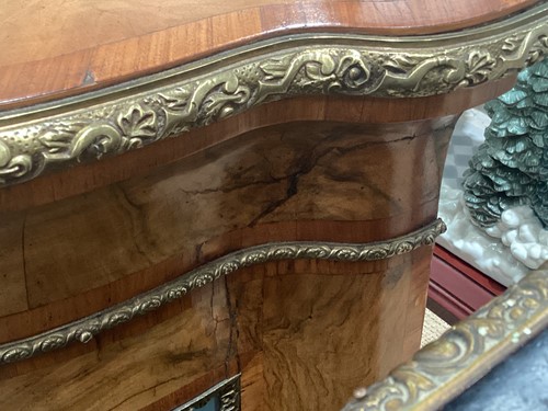 Lot 119 - A Victorian figured walnut credenza with a...