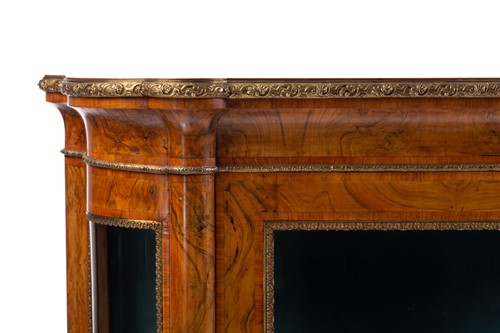 Lot 119 - A Victorian figured walnut credenza with a...