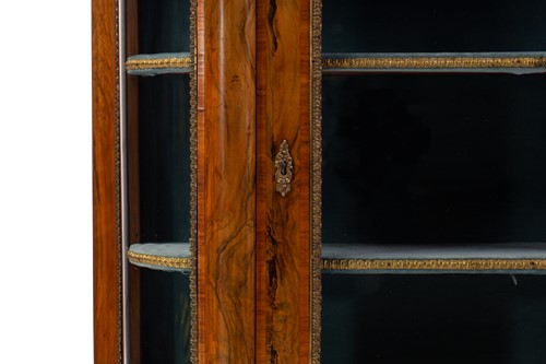 Lot 119 - A Victorian figured walnut credenza with a...