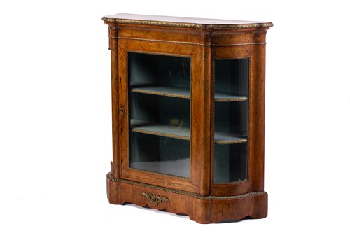 Lot 119 - A Victorian figured walnut credenza with a...