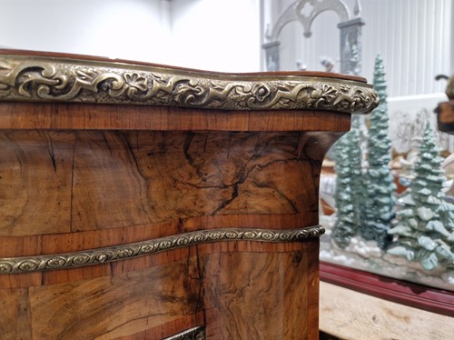 Lot 119 - A Victorian figured walnut credenza with a...