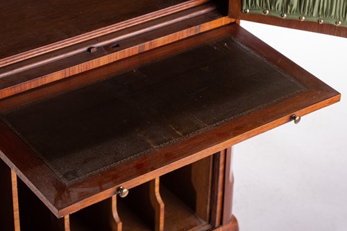 Lot 113 - A Louis XVI style marble topped rosewood music...