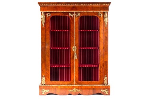 Lot 134 - A Victorian French style two door figured...