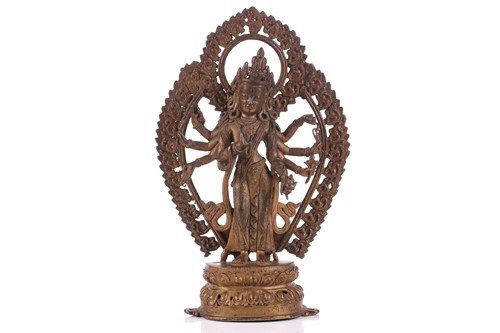 Lot 88 - A Nepalese bronze figure of Bodhisattva...