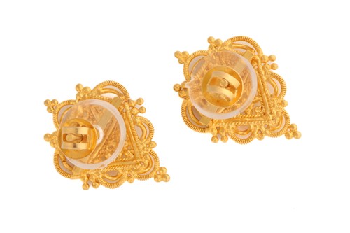 Lot 196 - A pair of yellow metal earrings, of ornate...
