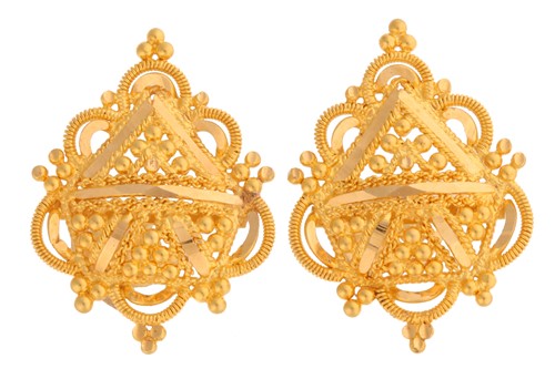 Lot 196 - A pair of yellow metal earrings, of ornate...
