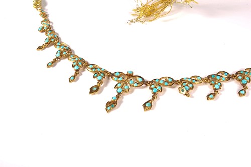 Lot 118 - A turquoise fringe necklace, of foliate design,...