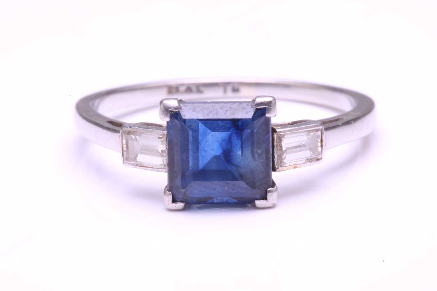 Lot 256 - A platinum, natural sapphire, and diamond...