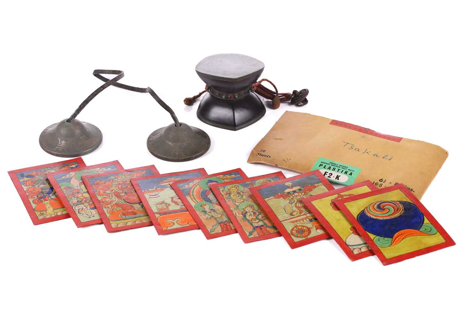 Lot 85 - A set of nine Tibetan tsakalis, initiation...