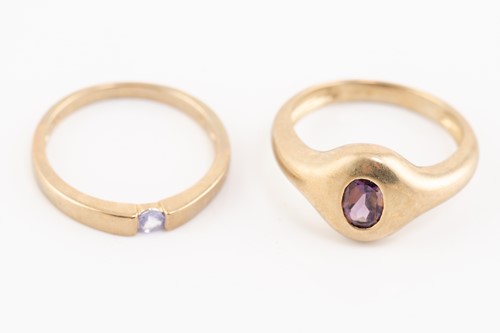Lot 185 - Five gem-set dress rings in gold; including a...