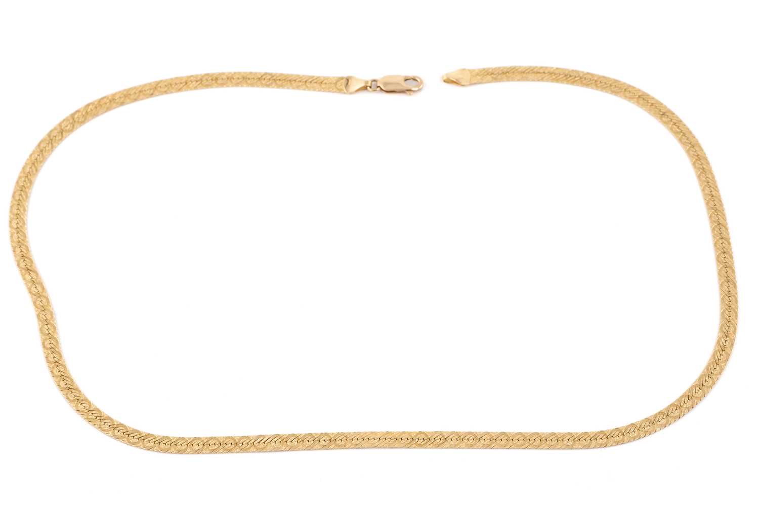 Lot 228 - A yellow metal herringbone chain necklace,...