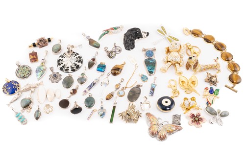 Lot 96 - A mixed collection of thirty eight pendants,...