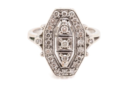 Lot 190 - An Art Deco-style diamond panel ring in 9ct...