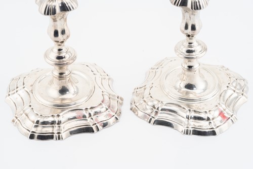 Lot 493 - A matched pair of George II/III cast silver...