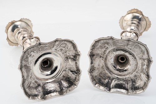 Lot 493 - A matched pair of George II/III cast silver...