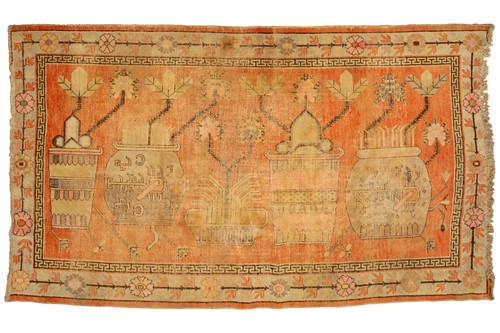 Lot 157 - A rust red ground Yarkand pictorial carpet,...