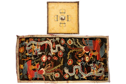 Lot 156 - A black ground Tibetan pictorial rug, late...