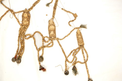 Lot 89 - A Tibetan carved bone necromancer's apron,...