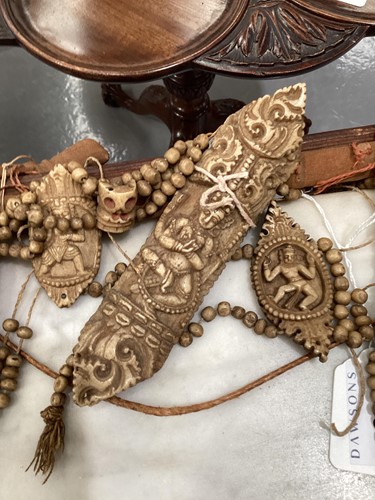 Lot 89 - A Tibetan carved bone necromancer's apron,...